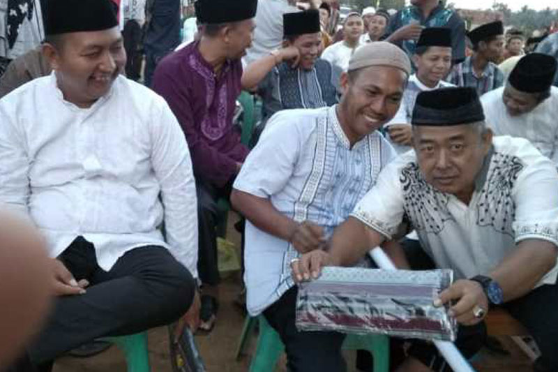 Kunjungi-Desa-Sidimulyo,-Tim-I-Safari-Ramadhan-Pemkab-Mesuji-Bagikan-Ratusan-Sarung-dan-Jilbab Kunjungi-Desa-Sidimulyo,-Tim-I-Safari-Ramadhan-Pemkab-Mesuji-Bagikan-Ratusan-Sarung-dan-Jilbab